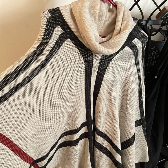 Sweaters - Pull over turtleneck sweater shall